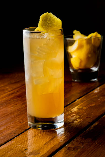 istock Cocktails. Alcoholic Drinks made with gin, vodka, rum or whiskey mixed with soda water, fruit juices and garnishes with limes and cherries. Classic American bar drinks. 1212783471