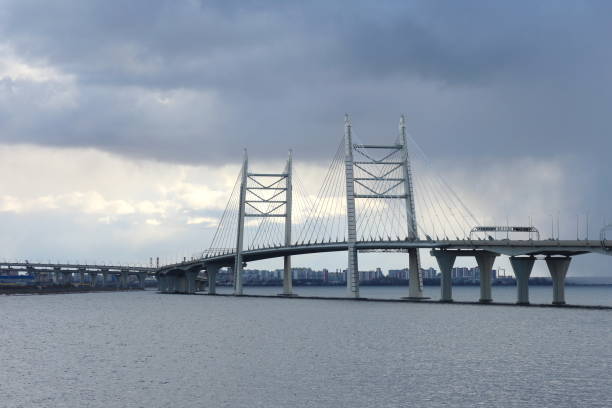 istock Seascape on a sunny evening with a large bridge 1212783592