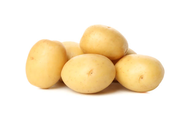 istock Heap of young potato isolated on white background 1212783596