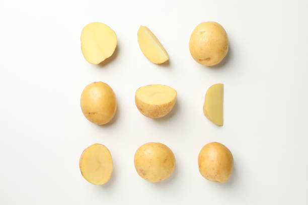 istock Flat lay with young potato on white background, top view 1212784009