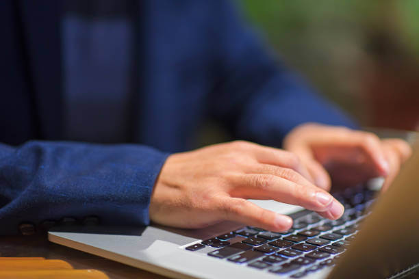 istock Close up of hands typing on laptop 1212784984