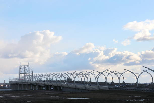 istock Big automobile bridge over the river 1212785866