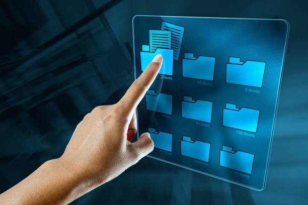 a woman hand is searching data in a folder on a digital screen a woman hand is searching data in a folder on a digital screen chasing photos stock pictures, royalty-free photos & images