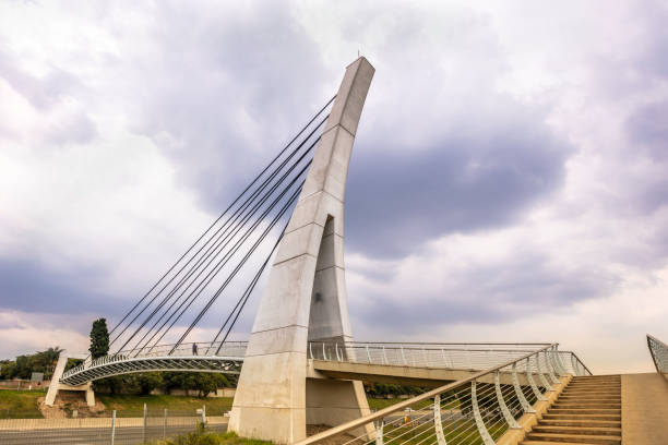 istock Pedestrian suspension bridge over the N1 highway 1212786748