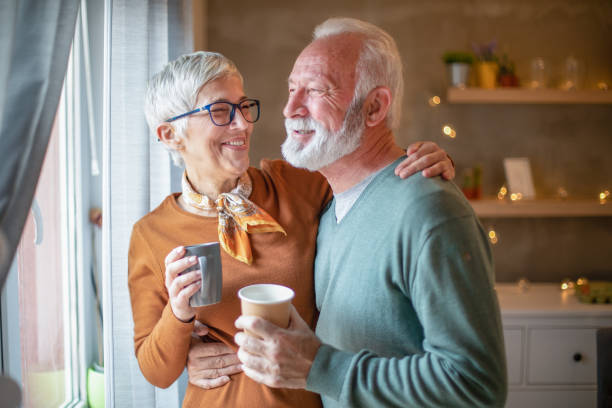 istock Beautiful senior couple drinking coffee. 1212787242
