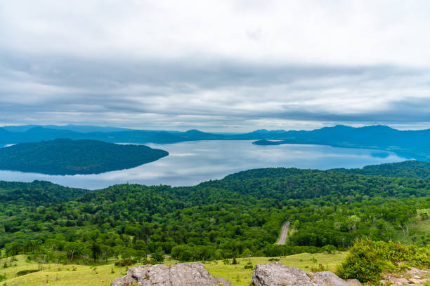 Lake Kussharo. Akan Mashu National Park, Hokkaido, Japan Natural landscape of Lake Kussharo in summer season sunny day. Akan Mashu National Park, Hokkaido, Japan. Translation : Bihoro-toge pass lookout national park akan stock pictures, royalty-free photos & images
