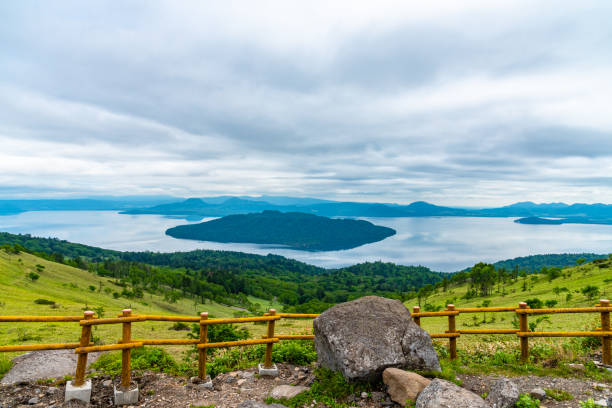Lake Kussharo. Akan Mashu National Park, Hokkaido, Japan Natural landscape of Lake Kussharo in summer season sunny day. Akan Mashu National Park, Hokkaido, Japan. Translation : Bihoro-toge pass lookout national park akan stock pictures, royalty-free photos & images