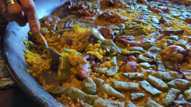 valencia spain paella in a country house on wood table