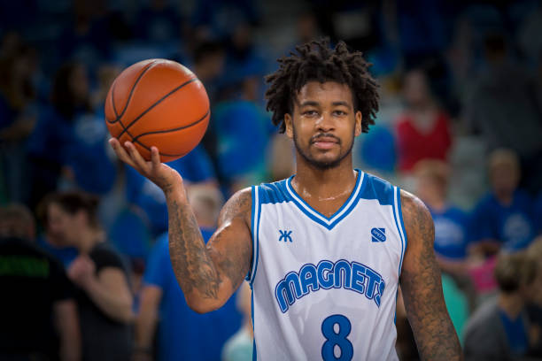 Basketball player holding ball