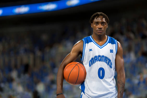 istock Basketball player with ball 1212788841