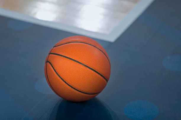 istock Basketball on court 1212788851