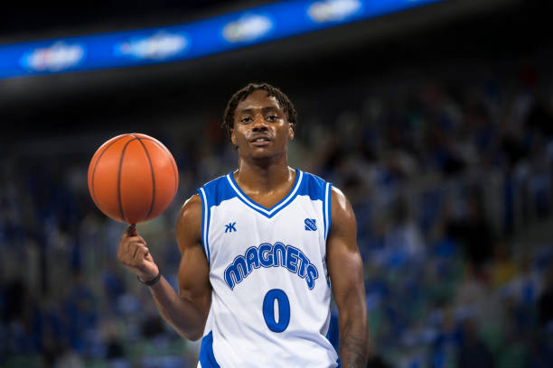 istock Basketball player with ball 1212788857