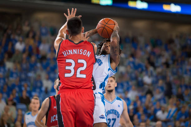istock Basketball player attempting to dunk 1212788858