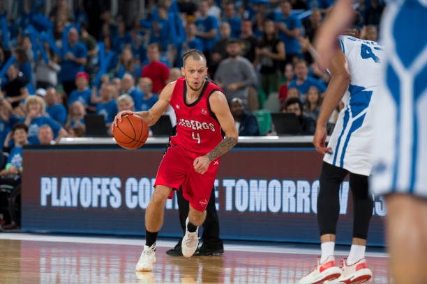 Basketball player dribbling ball