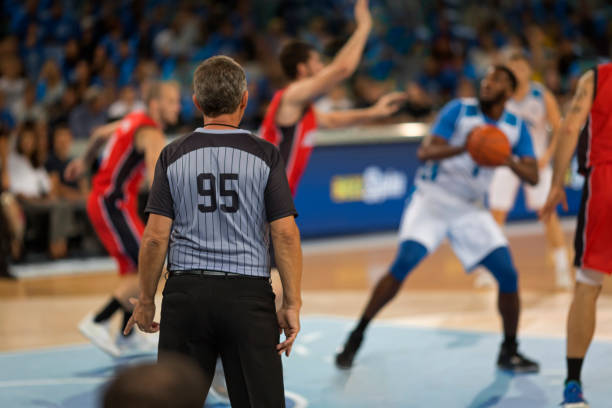 istock Referee monitoring game 1212788877