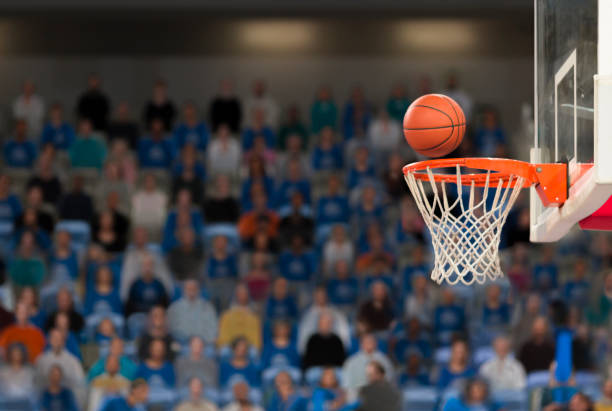 Basketball reaching to hoop in Arena Stozice, Ljubljana, Slovenia.