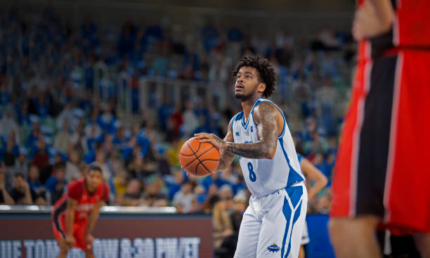 istock Basketball player with ball 1212788899
