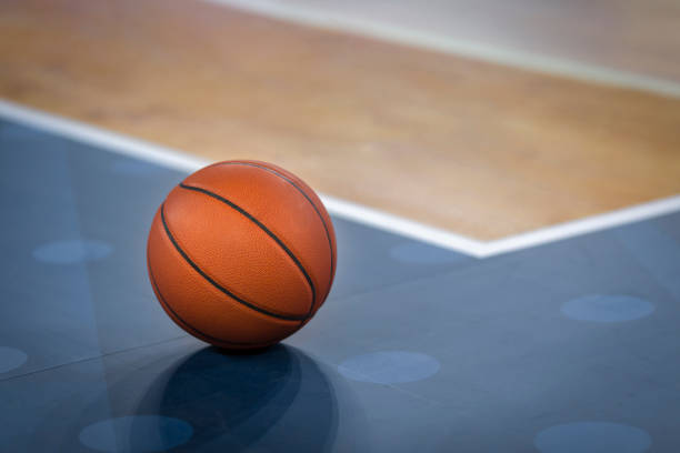 istock Basketball on court 1212788900