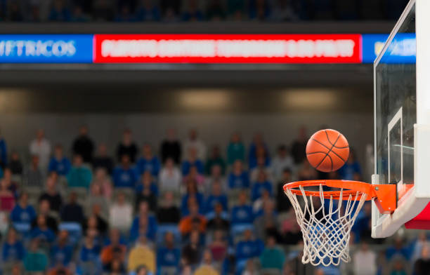 istock Ball reaching to hoop 1212788926