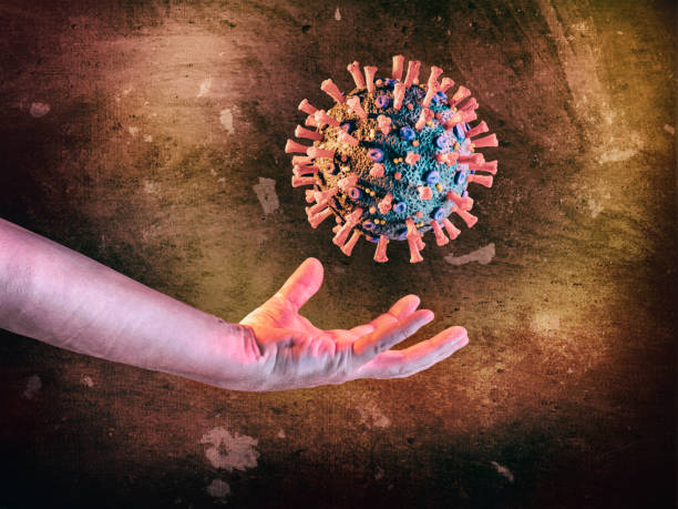 istock Hands catching COVID-19 Corona Virus floating microscopic macro mockup 1212789740