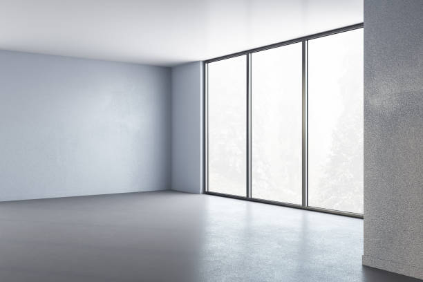 istock Modern interior room with blank concrete wall 1212789884