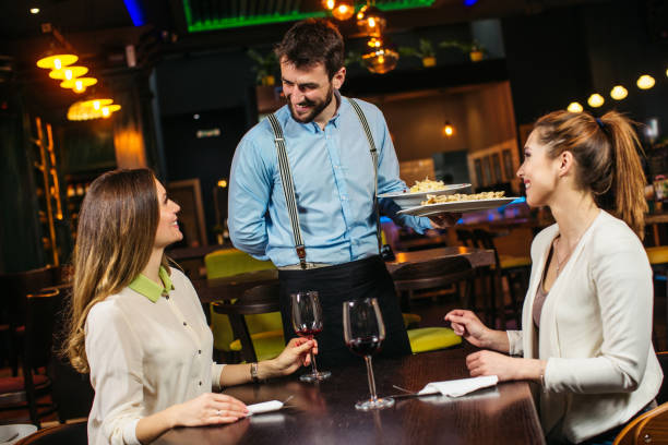 istock Serving lunch to a female guest 1212789943