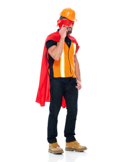 istock Young male hero repairing wearing boot and using smart phone 1212790300