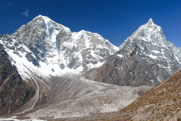 istock Tobuche and Taboche mountain peaks in Himalayas 1212791730