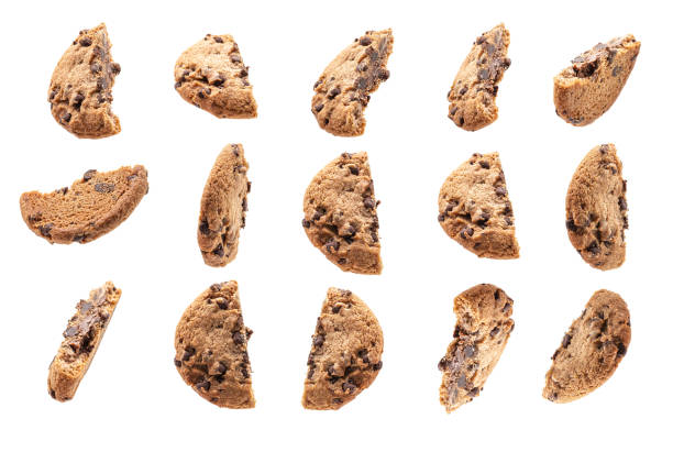 istock Collection of half chocolate chip cookies on white background 1212793881
