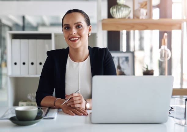 istock She always works with a smile on her face 1212803604