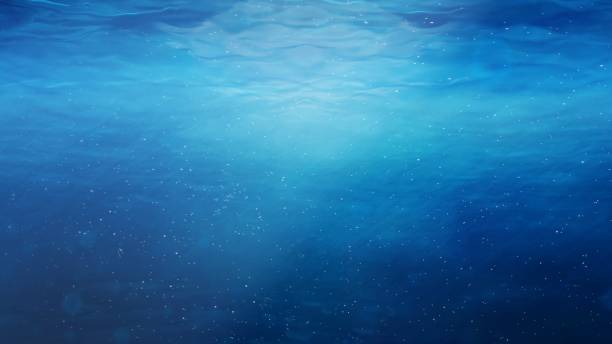 Underwater Near Ocean Surface with Rising Bubbles in Blue Sea - Abstract Background Texture This abstract texture background graphic is high definition and a great quality pattern that can be used for various purposes. vj loop stock pictures, royalty-free photos & images