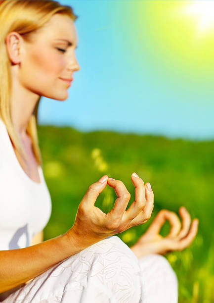 Yoga meditation outdoor, healthy female in peace, soul and mind zen balance concept