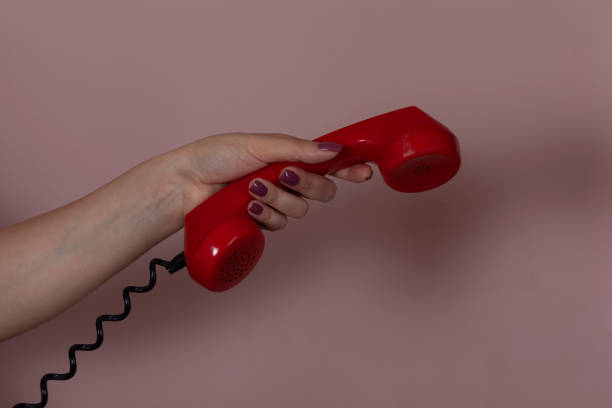 istock woman hand vintage phone 1212806281