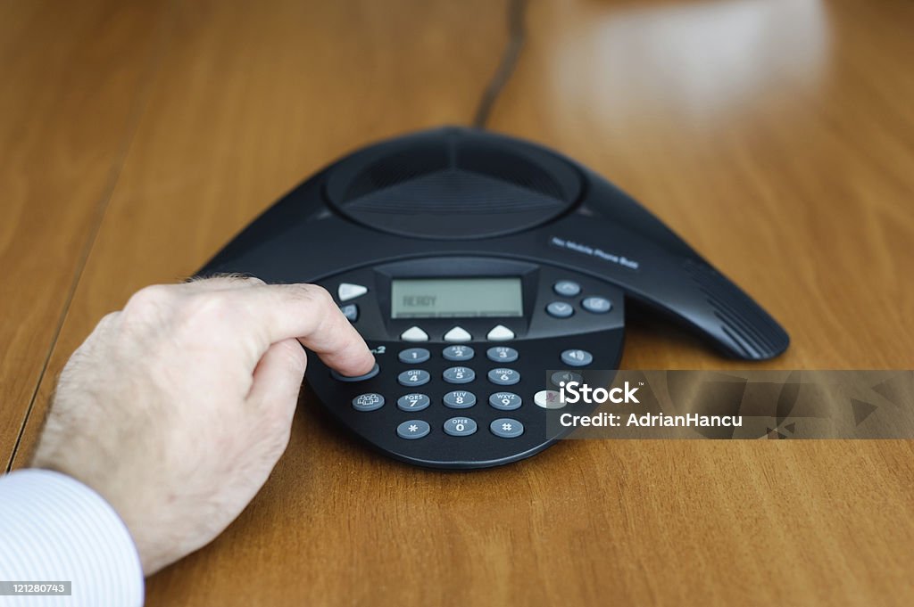 Businessman dialing conference call  Business Meeting Stock Photo