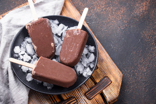 istock Chocolate ice cream popsicles in glaze 1212807453