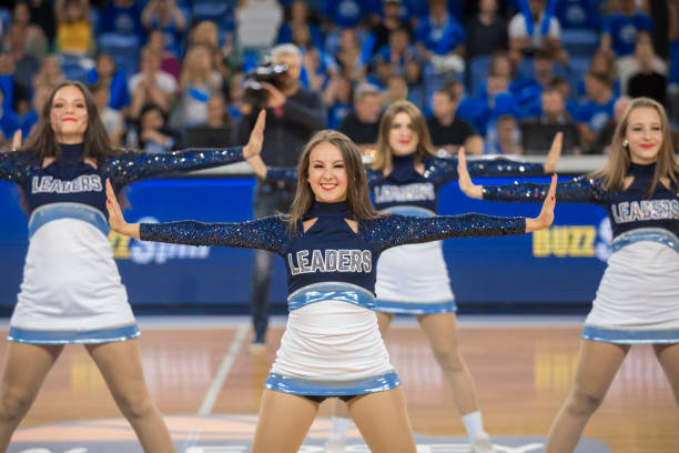 istock Cheerleaders performing in basketball court 1212807614