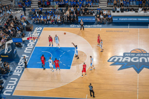 istock Basketball player shooting a free throw 1212807659