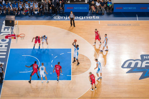 istock Basketball player shooting a free throw 1212807675