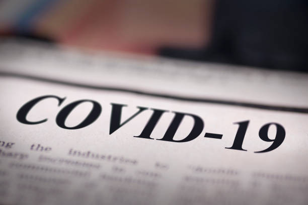 istock COVID-19 written newspaper 1212807905