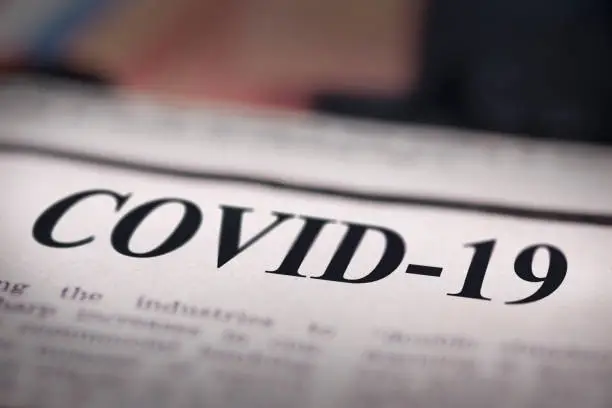 Photo of COVID-19 written newspaper