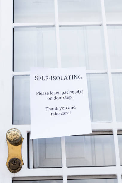 istock Coronavirus Self Isolation Sign on Door 1212808918