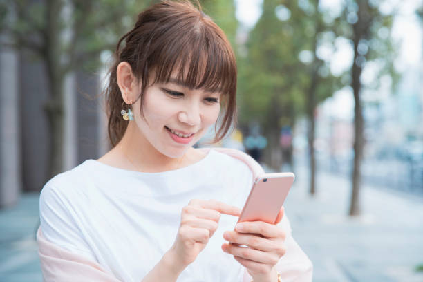 young woman using smart phone