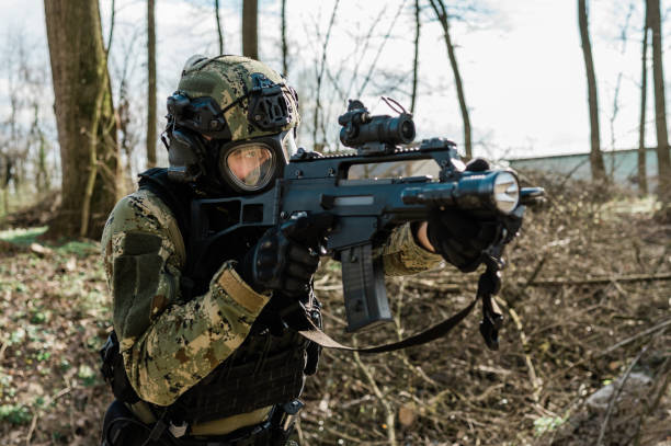 istock Soldier with gas mask 1212815320