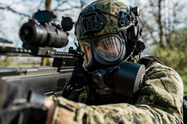 istock Soldier with gas mask 1212815322