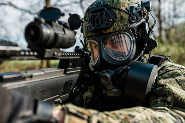 istock Soldier with gas mask 1212815326