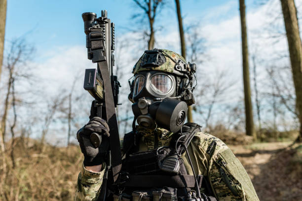 istock Soldier with gas mask 1212815334