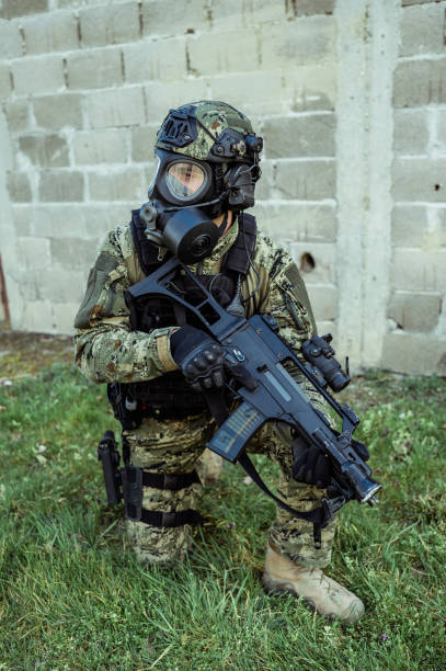 istock Soldier with gas mask 1212815356