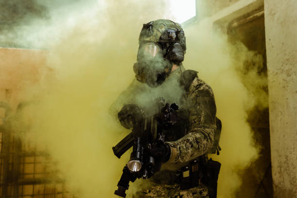 istock Soldier with gas mask 1212815382