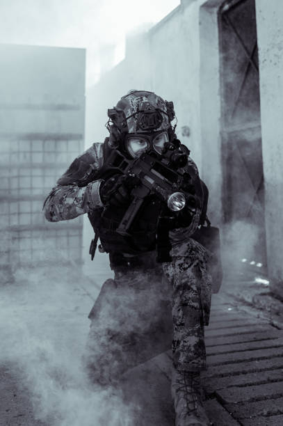 istock Soldier with gas mask 1212815389
