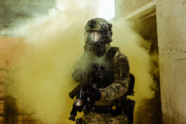 istock Soldier with gas mask 1212815397